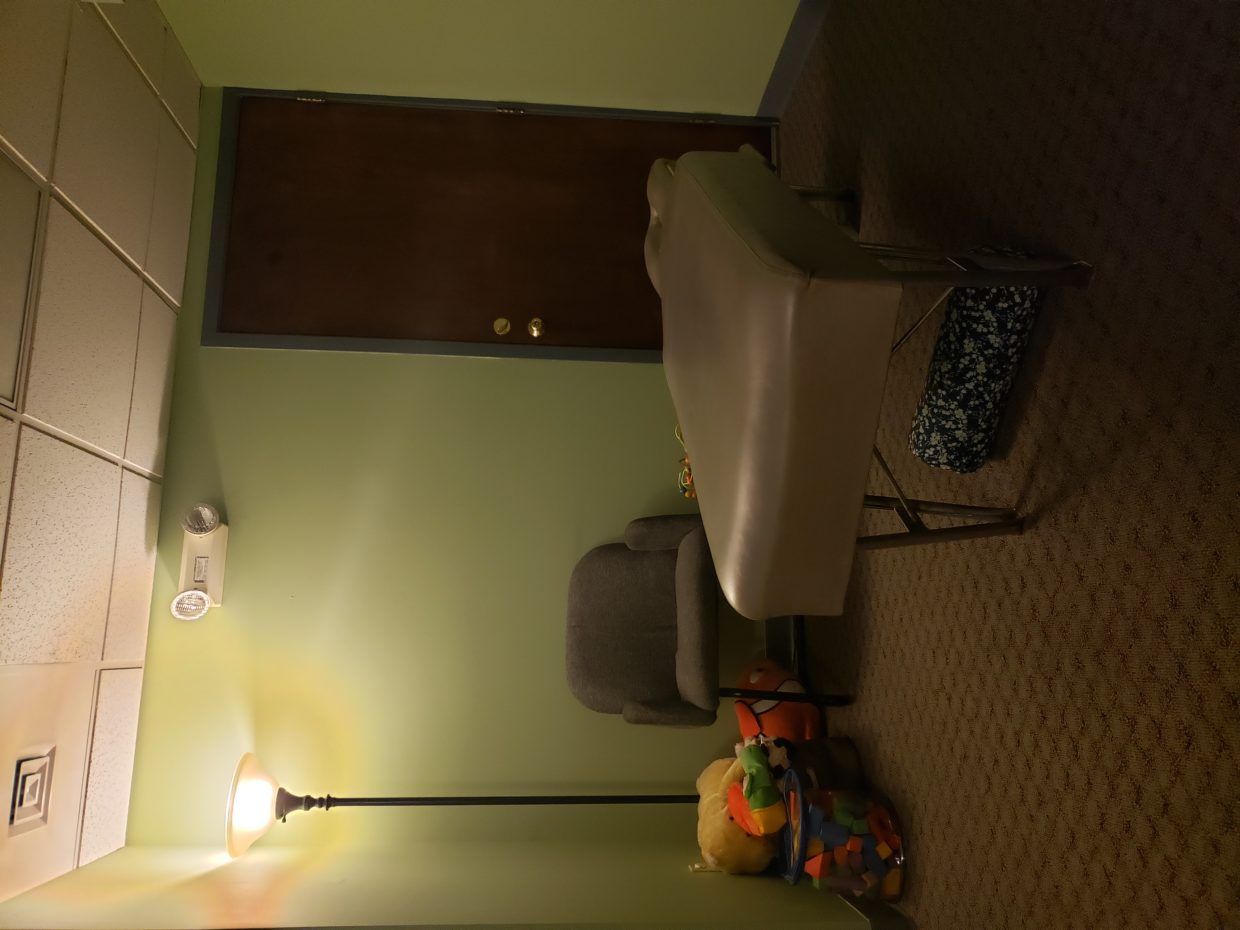 Chiropractic adjusting room with treatment table at Community Chiropractic