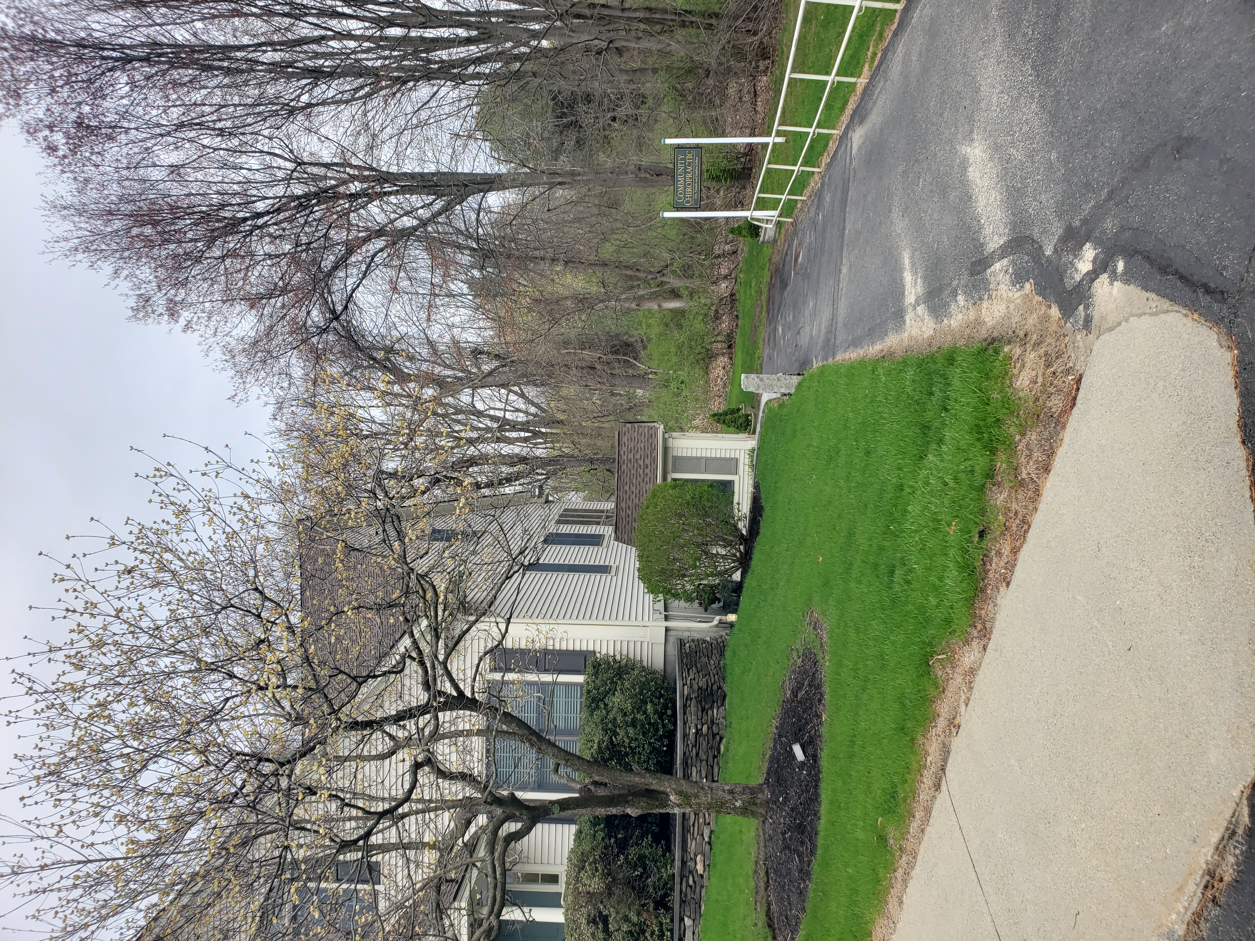 Exterior view of Community Chiropractic grounds with pathway