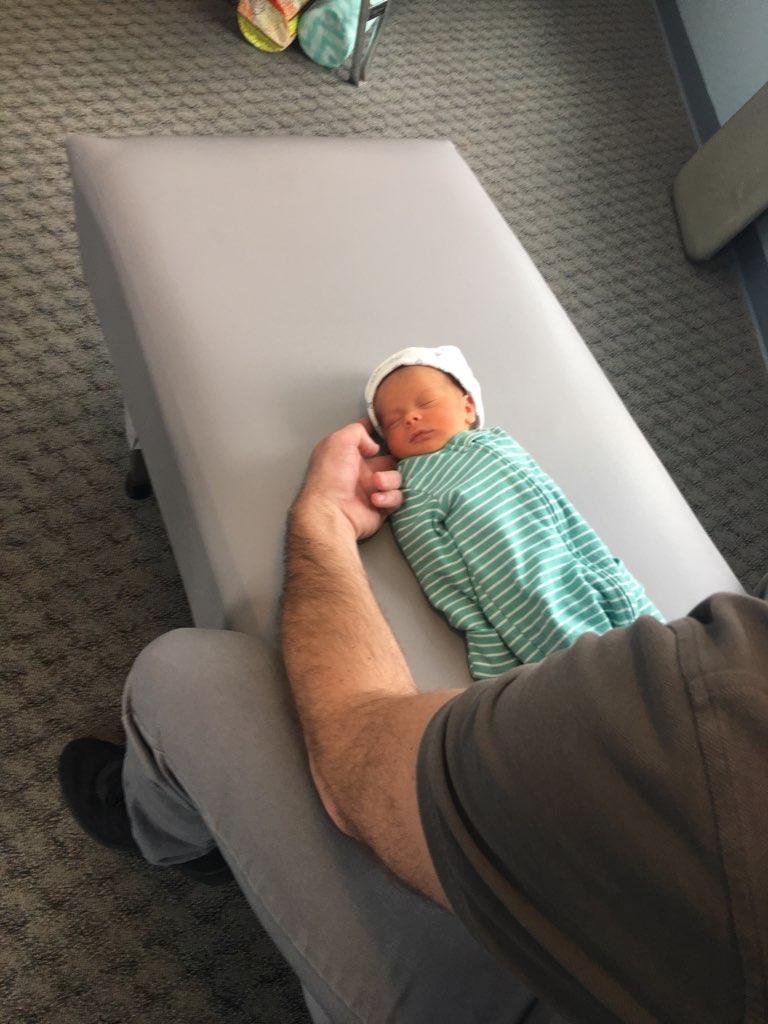 Dr. Steve providing gentle chiropractic care to a newborn