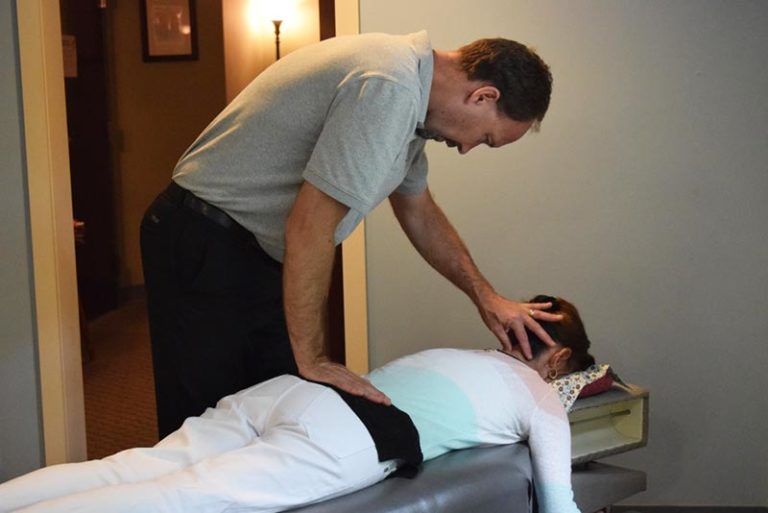 Dr. Steve performing a chiropractic adjustment