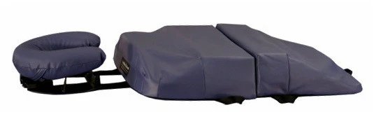 Specialized pregnancy table with belly cutout for comfortable face-down positioning during chiropractic care